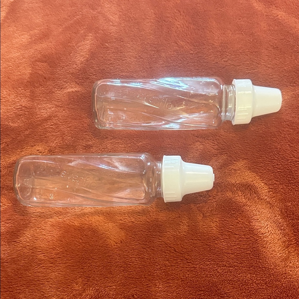 Transparent Baby Bottles with White Caps
